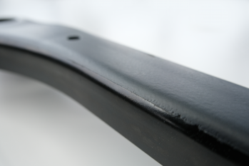 Lackartige Beschichtung auf Längsträger